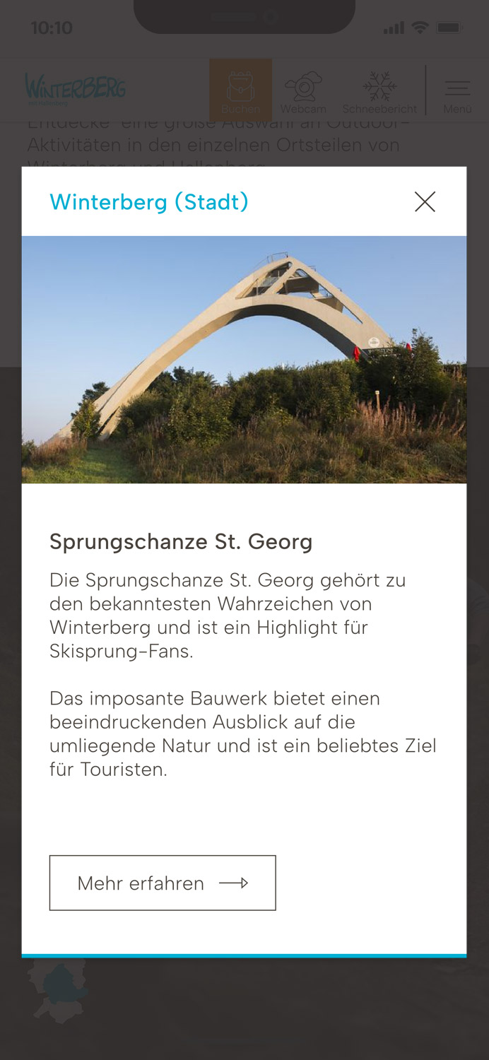 Darstellung der mobilen Website von Winterberg Tourismus, zeigt wichtige Informationen und Benutzerinteraktionen, hier: geöffnetes Pop-Up der Detailansicht eines POI auf der Abenteuerkarte